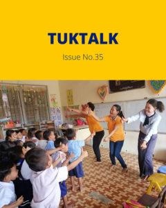 TukTalk Issue No. 35 cover with teachers and young children dancing together in a classroom