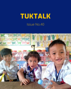 TukTalk Issue No. 40 cover with three smiling young children in uniform sitting at a classroom table