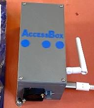 The AccessBox, a small grey box with a blue label and an antenna, that serves the library offline