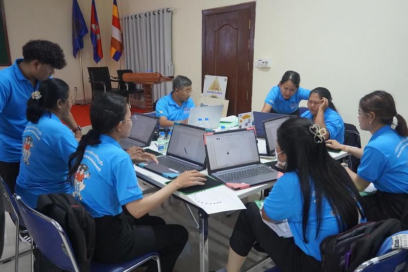 Preschool teachers work on laptops during the computer worksheet session of the fifth workshop