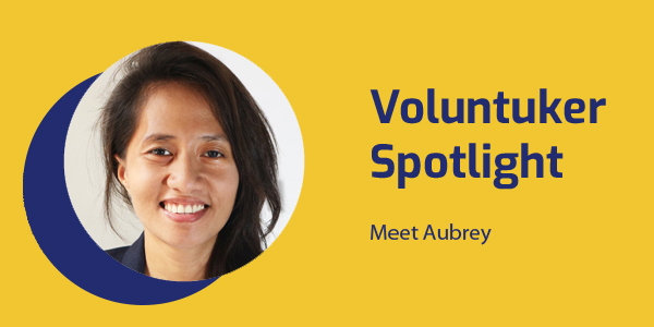 Voluntuker Spotlight banner with a smiling portrait of volunteer Aubrey