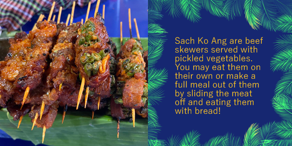Grilled beef skewers on a banana leaf, the Khmer food of the month Sach Ko Ang, with a short description
