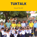 TukTalk 65 cover: preschool children in uniform raise their hands beside teachers and TukTuk staff