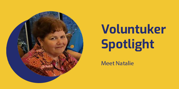 Voluntuker Spotlight banner with a smiling portrait of Natalie, a former Canadian primary school teacher who volunteered