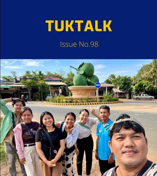 TukTalk issue 98 cover above a selfie of TukTuk staff and friends posing beside a roundabout monument